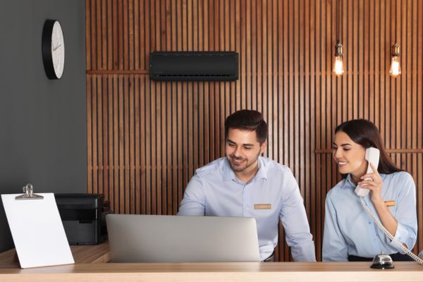 Lumnia behind employees