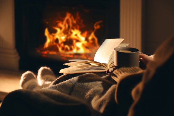 reading by a fire