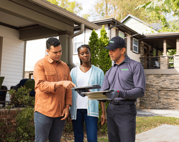 Terminix tech talking with customers