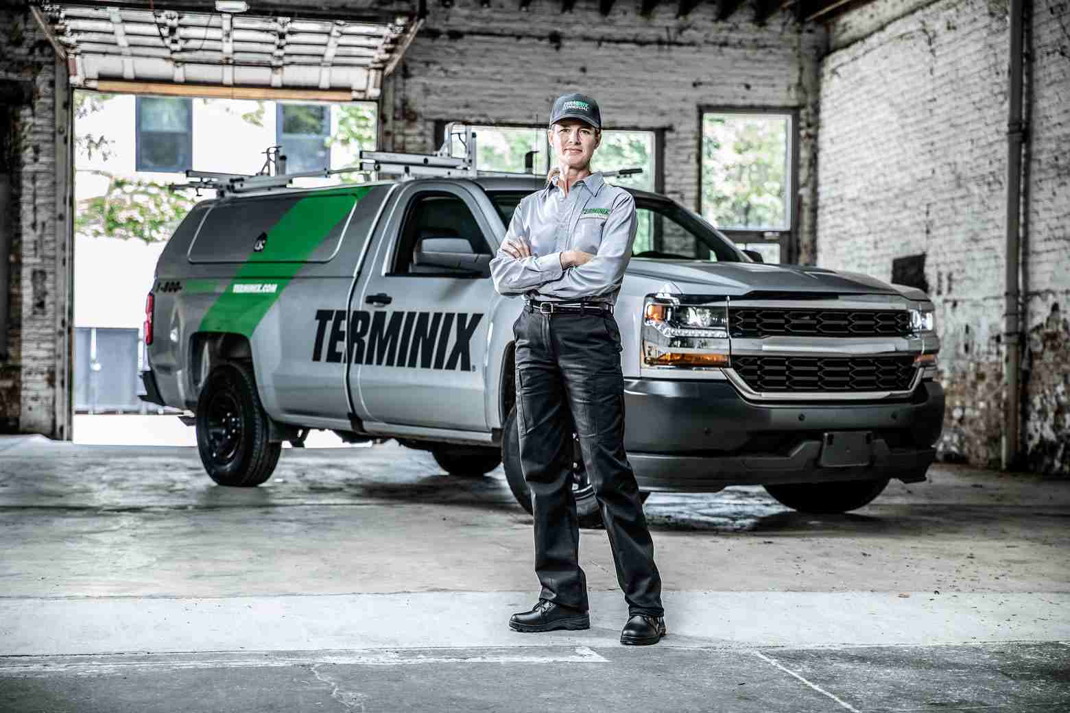 technician in front of truck