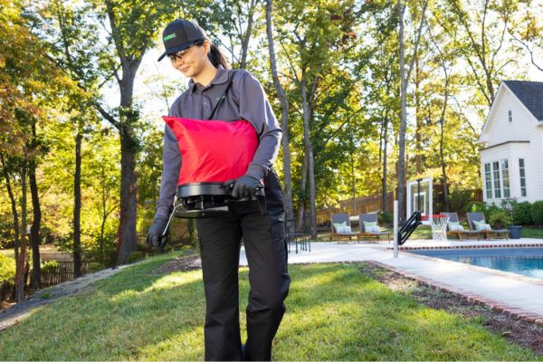tech treating ticks