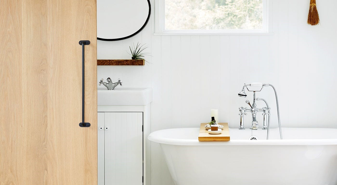 clean white bathroom with claw foot tub