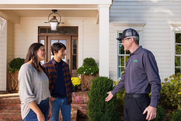 terminix technician with colleagues