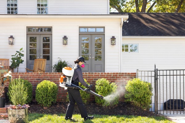 mosquito control being sprayed outside