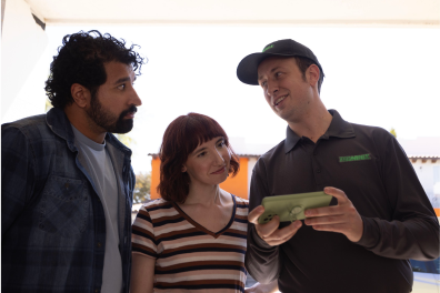 Terminix technician talking with a couple